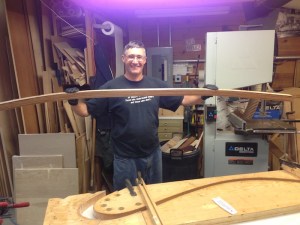 Phil Crane holding laminates.